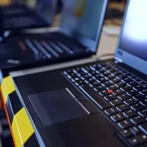 Old laptops on a work bench